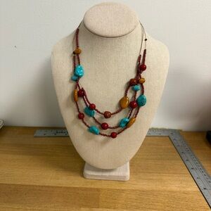 Blue and brown stone beaded layer necklace with red seed beads